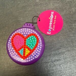Expressions bling pop-up brush NWT never been used